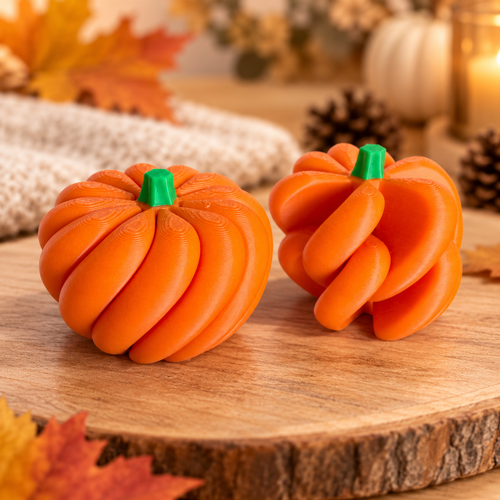 Orange and green 3D printed articulated pumpkin fidget toy