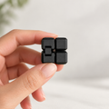 Black mini infinity cube fidget folded closed