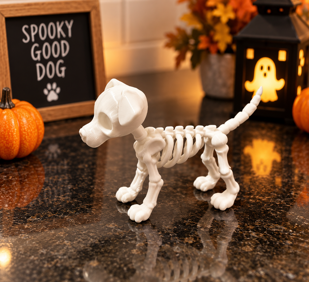 White 3D printed skeleton dog figure in a cozy Halloween display